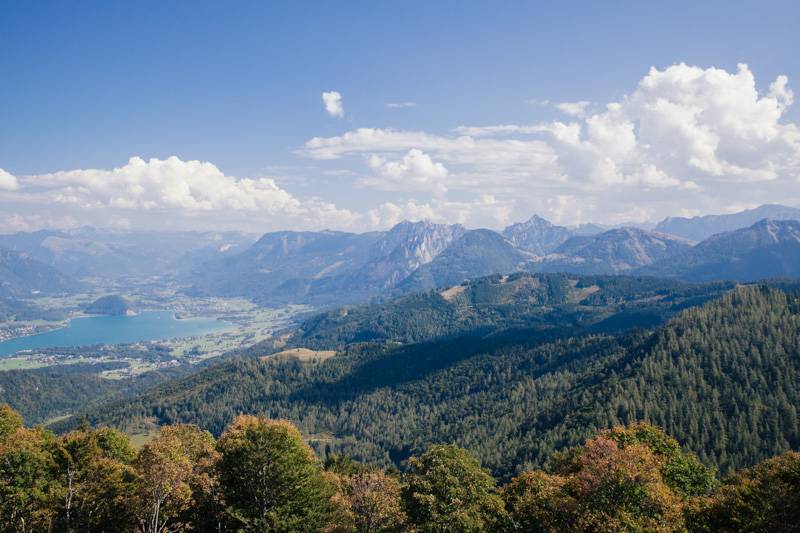 View of forest, mountains and Lake Wolfgang from the top of Zwölferhorn mountain, Austria