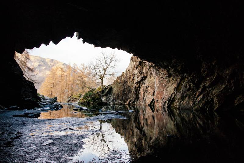 Standing inside Rydal Cave, with a view of the opposite fells in the Lake District